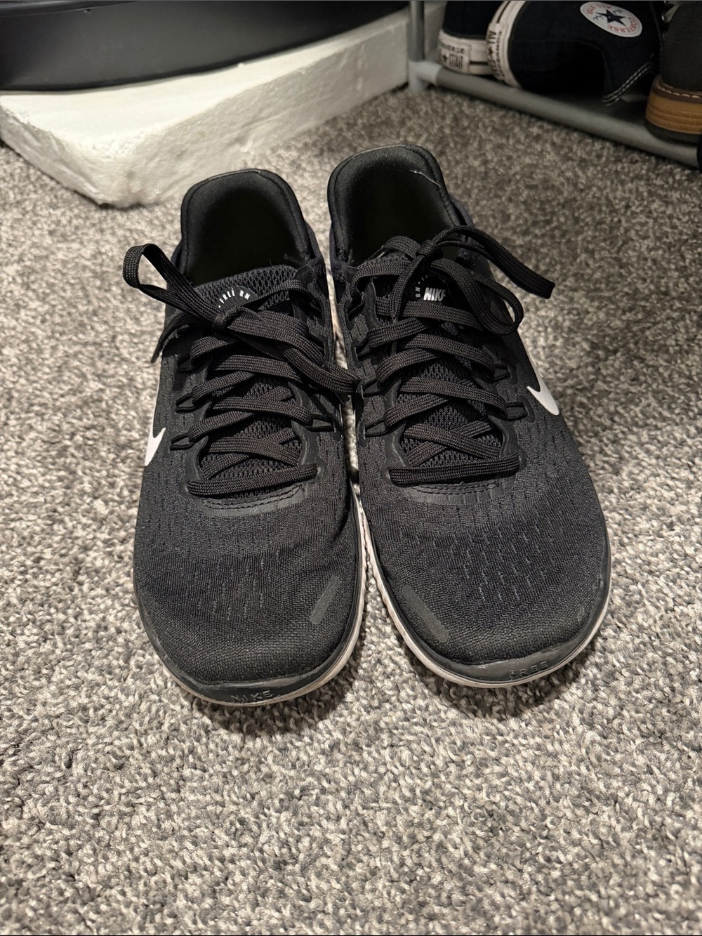 Nike Women’s Black Athletic Running Shoes with White Swoosh